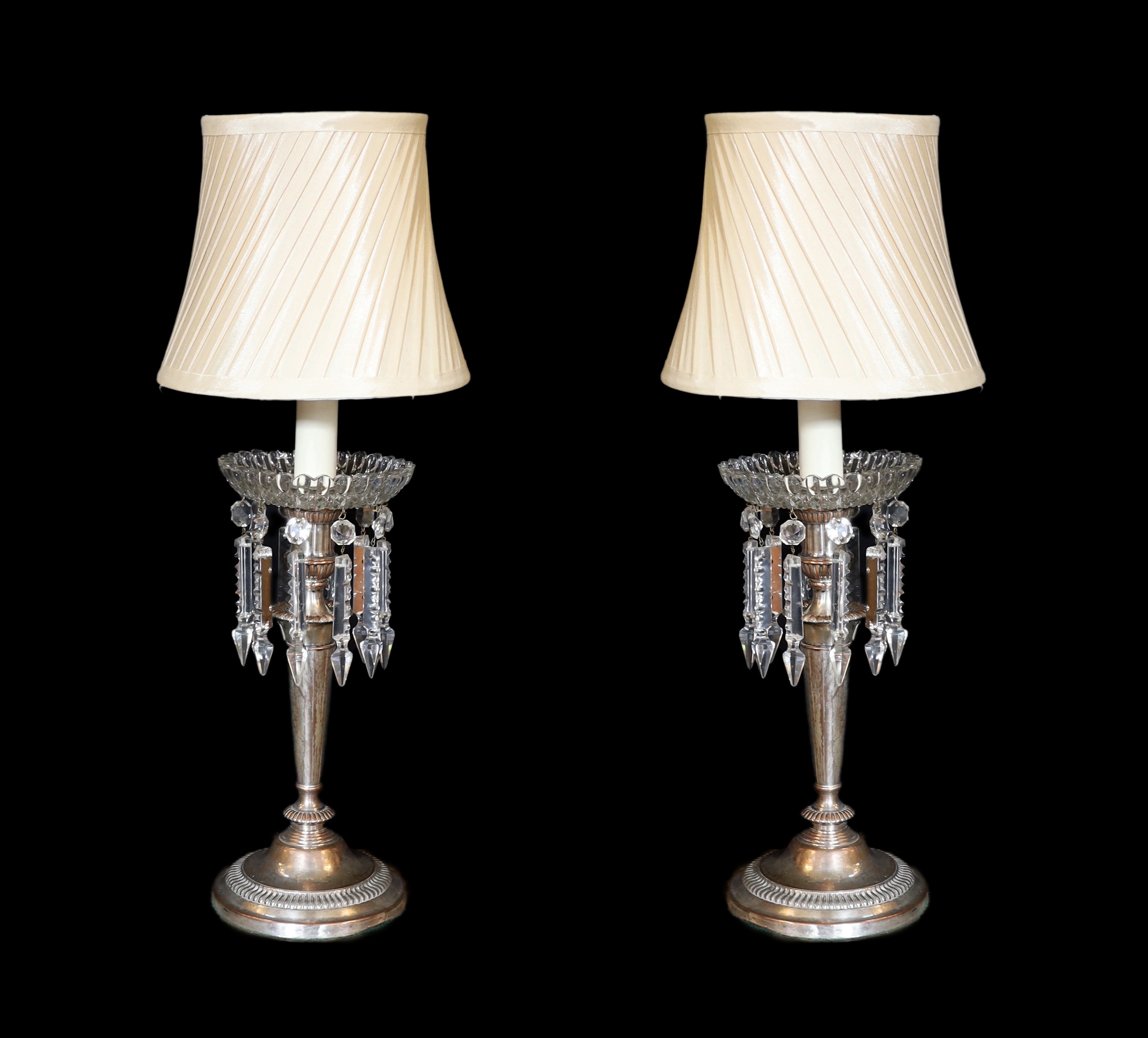A pair of old Sheffield plate table lamps with moulded and cut glass lustre drops, height 44cm